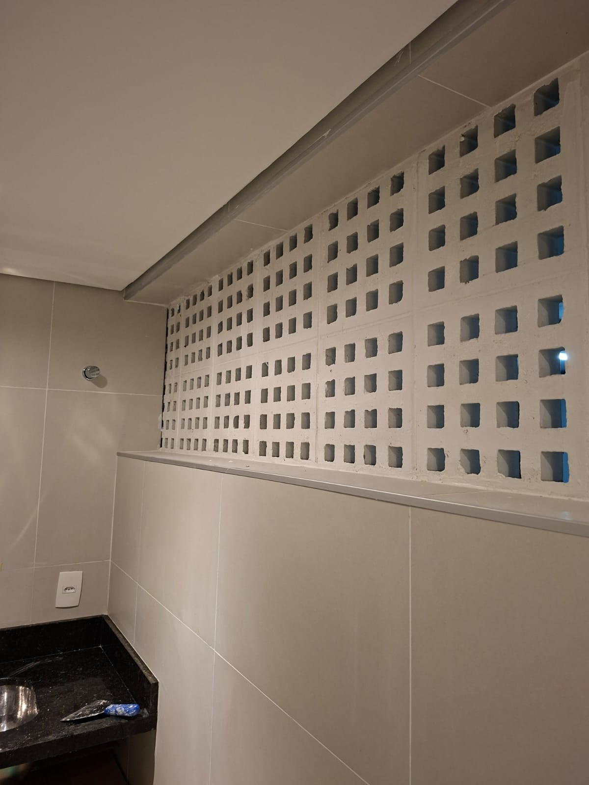 Revestimento interno com elemento vazado